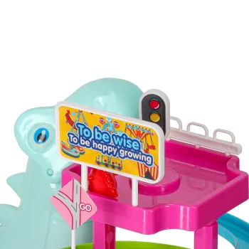 detal kolorowych elementów toru i samochodzików dinozaurów