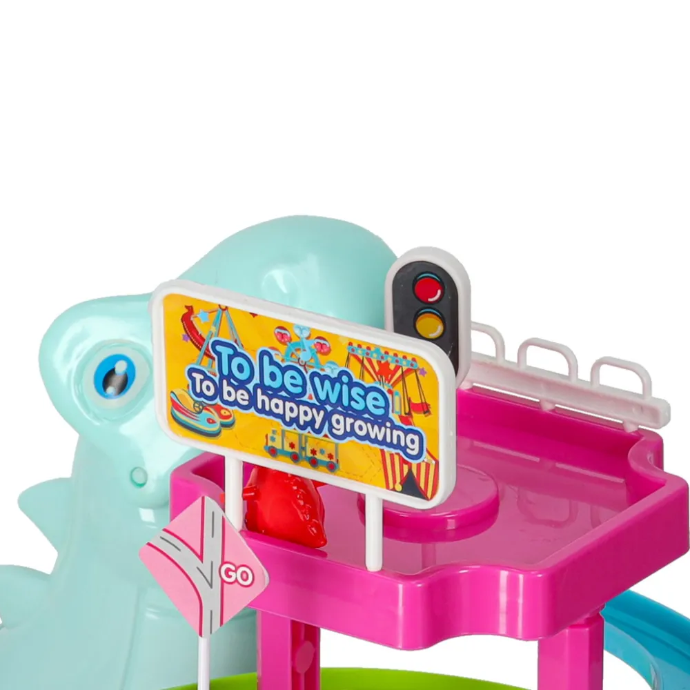 detal kolorowych elementów toru i samochodzików dinozaurów