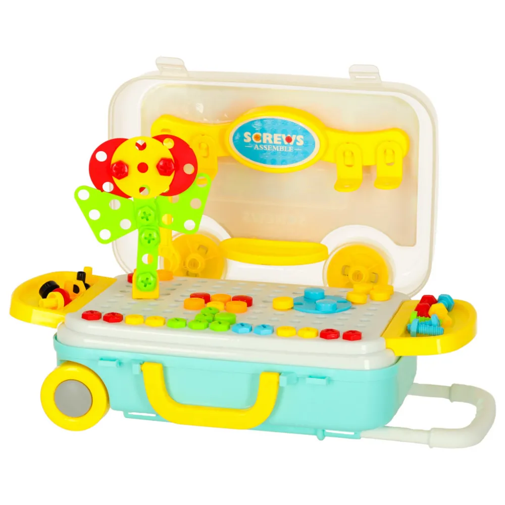 zestaw majsterkowicza z rozłożonymi akcesoriami obok walizki