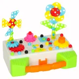 zbliżenie na wkrętarkę oraz plastikowe śrubki zestawu